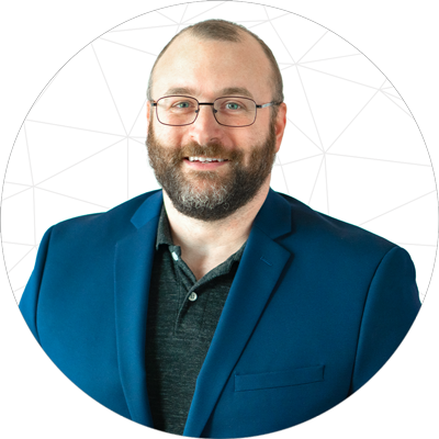 Professional headshot of Tyler Grimh